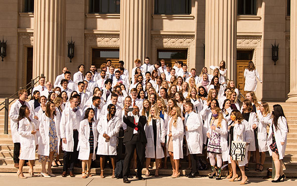 The latest School of Dentistry class poses in front of Northrop Auditorium