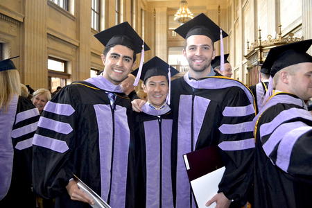 Mehrdad Hairani, Andrew Lau, and Daniel Allman at their graduation