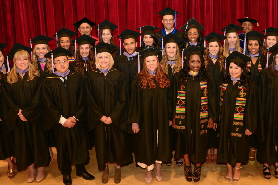 recent class of Dental Hygiene at graduation wearing cap and gown