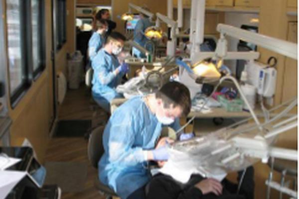 Dental students working in class