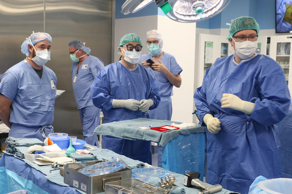 MHealth operating room with residents and doctors