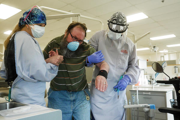 man in Hibbing, Minnesota being helped for dental health