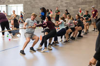 Students play tug-of-war at orientation