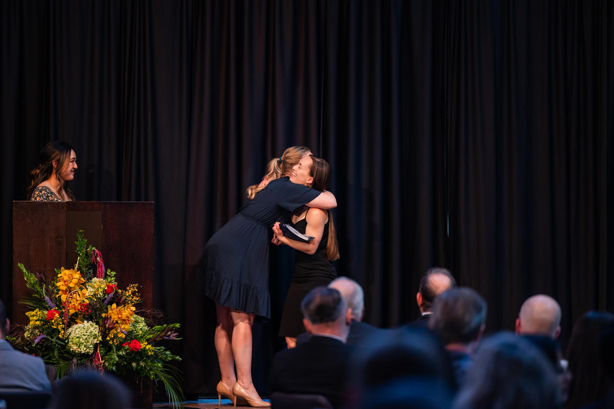 A student receives their award onstage