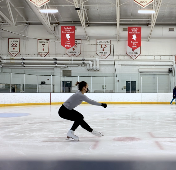 Leen Wu, DDS ’25 figure skating on ice