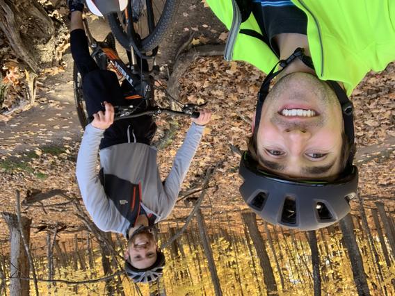 Cole Johnson and Jeffrey Janssen take a selfie on bikes
