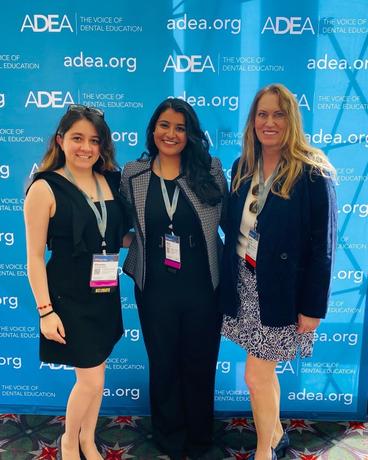 Three Students pose at ADEA