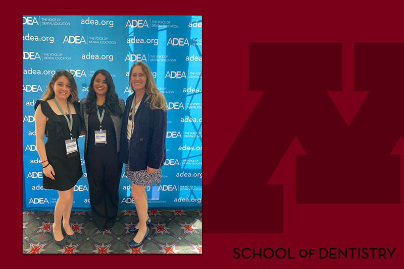 Lanette Wedell with Ishita Aghi and Parandis Kazemi at ADEA, on a School of Dentistry branded background