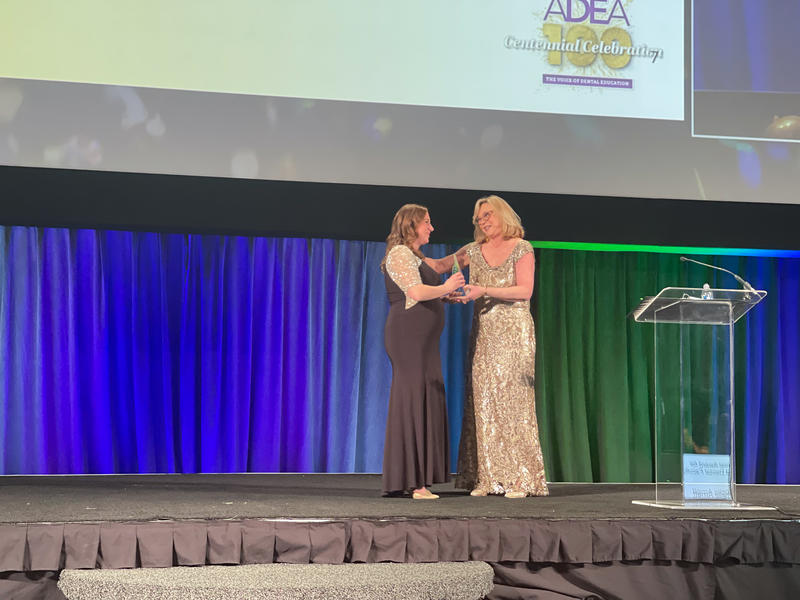 Michelle Arnett receives award at ADEA conference