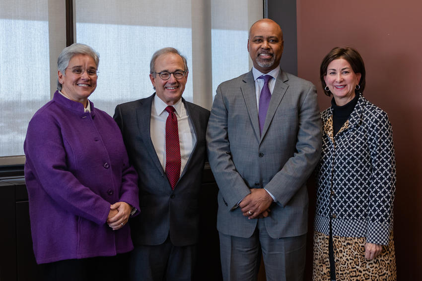 Four people smile at the camera. from left to right: Stephanie Albert, president, Delta Dental of Minnesota Foundation; Michael Zakula, DDS; Dean Keith Mays, DDS, MS, PhD; Kathy Schmidlkofer, president & CEO, University of Minnesota Foundation