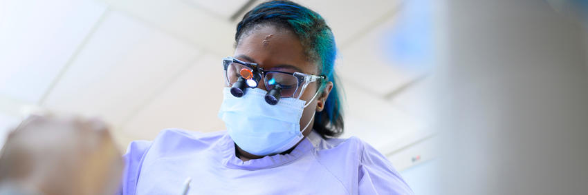 dental therapy student provides care to a patient