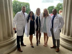 Stanislas Ogokeh and other first-year DDS students at the White Coat Ceremony
