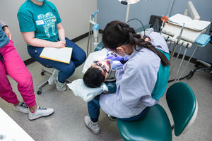 A child receives dental care